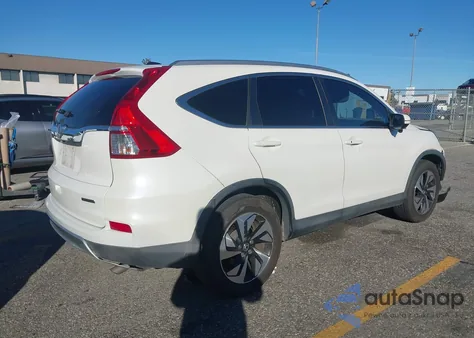 2016 Honda Cr-V Touring z USA, uszkodzony, nr VIN 5J6RM3H91GL016095